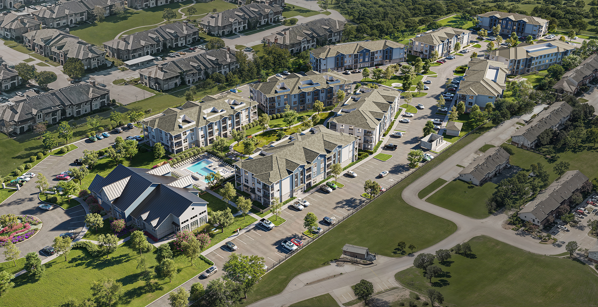 A bird's eye view of a residential area with houses and a swimming pool.